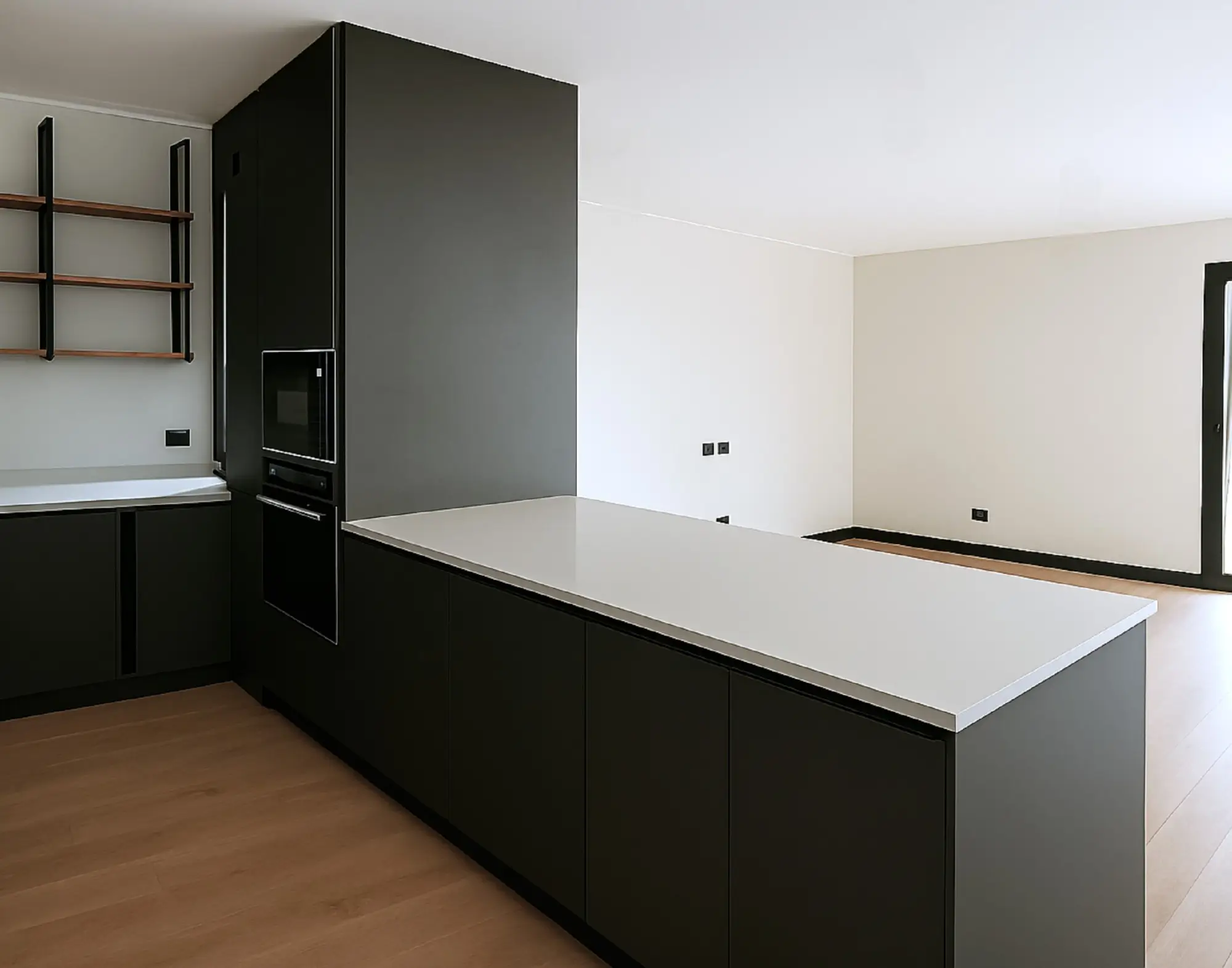 Cocina moderna con isla central en melamina negra mate, repisas flotantes de madera y electrodomésticos empotrados, diseño personalizado de Style Muebles en Perú